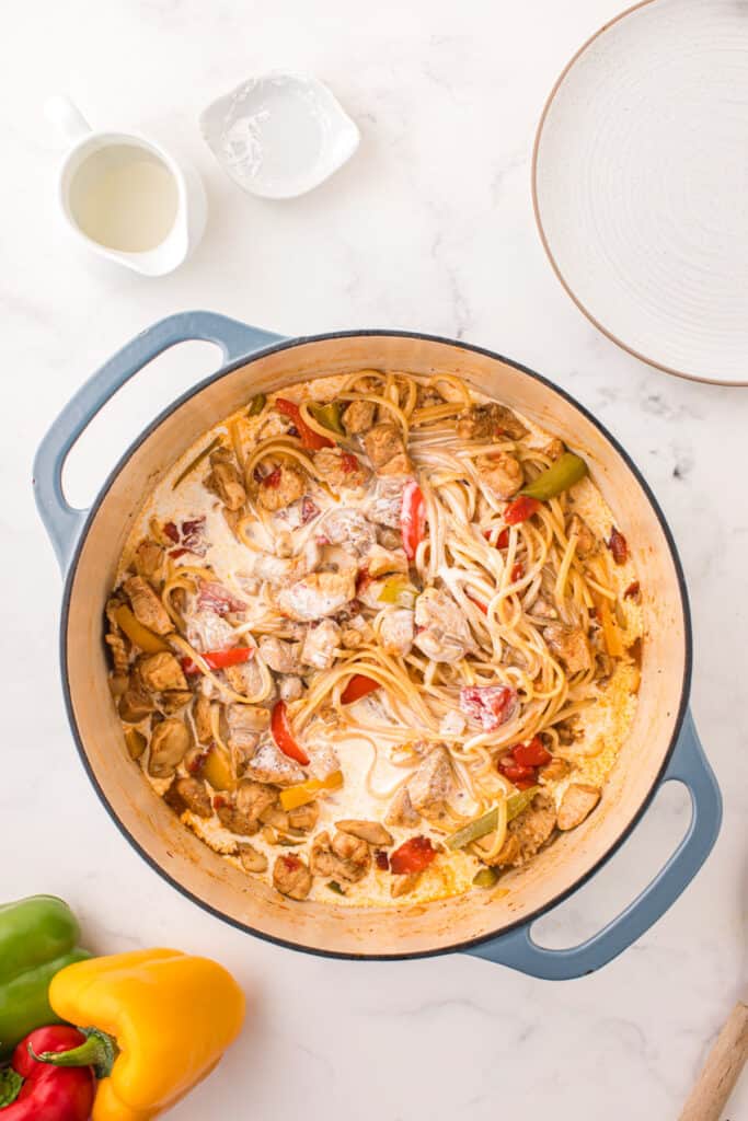 Heavy cream stirred into Cajun chicken and linguine to create the creamy pasta sauce