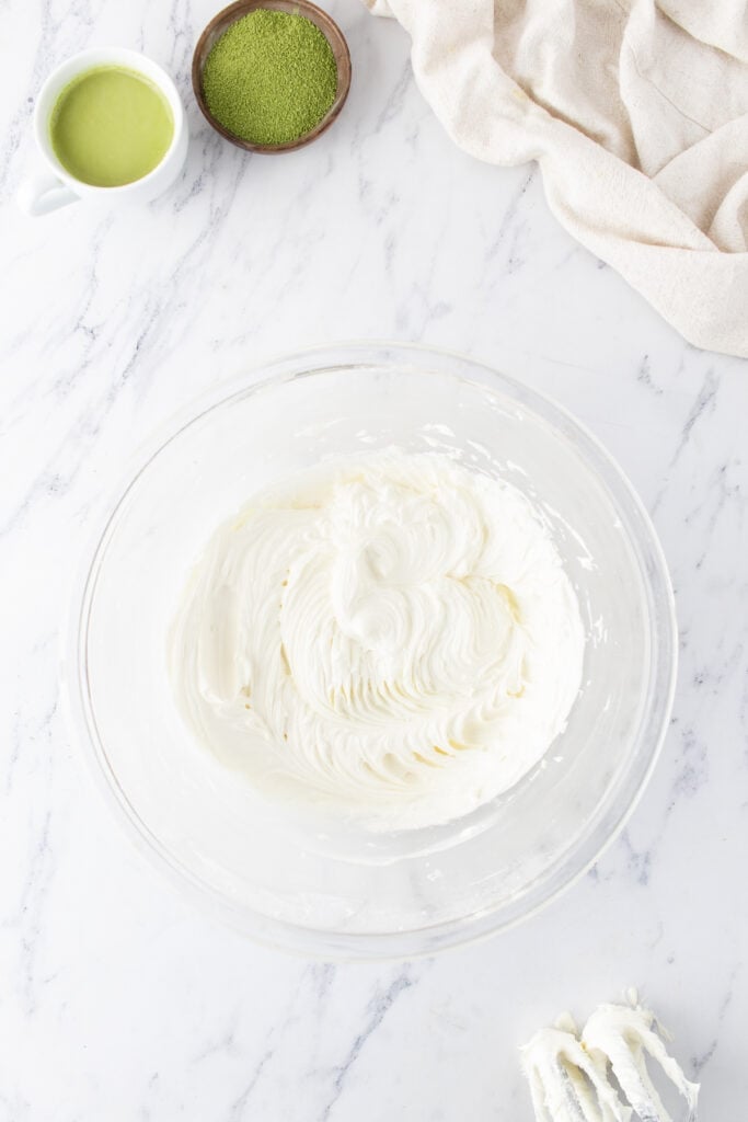 Smooth homemade vanilla buttercream ready for piping onto Matcha Cupcakes