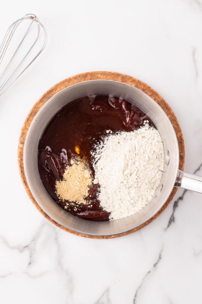 Barbecue sauce, ranch seasoning, honey, hot sauce, and dry mustard in a saucepan