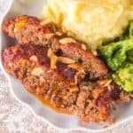 Smoked Cowboy Meatloaf with barbecue glaze and crispy fried onions served with mashed potatoes and broccoli