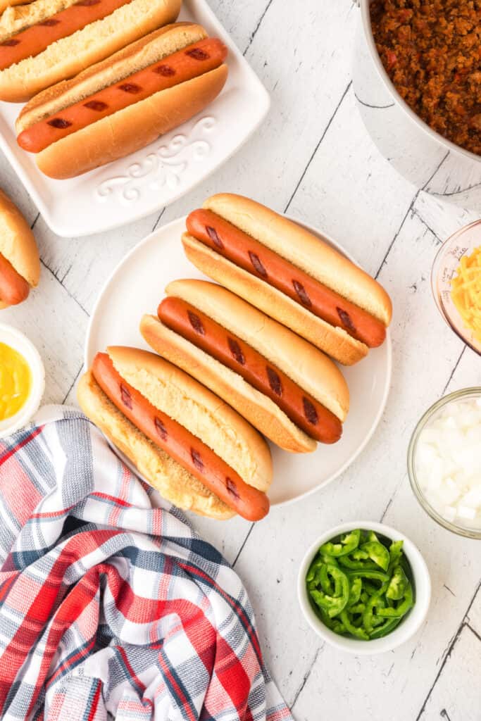 Grilled hot dogs served in toasted hot dog buns