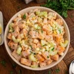 Overhead Sweet Potato Salad with creamy sweet potatoes, celery, onion, chopped eggs, and fresh parsley