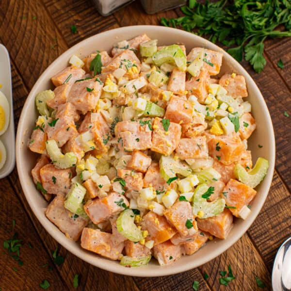 Overhead Sweet Potato Salad with creamy sweet potatoes, celery, onion, chopped eggs, and fresh parsley