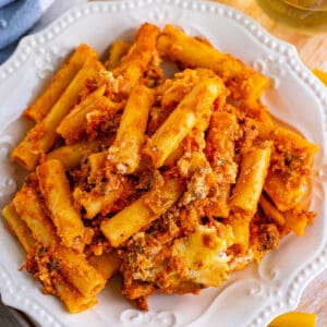 portion of baked ziti on a white serving plate