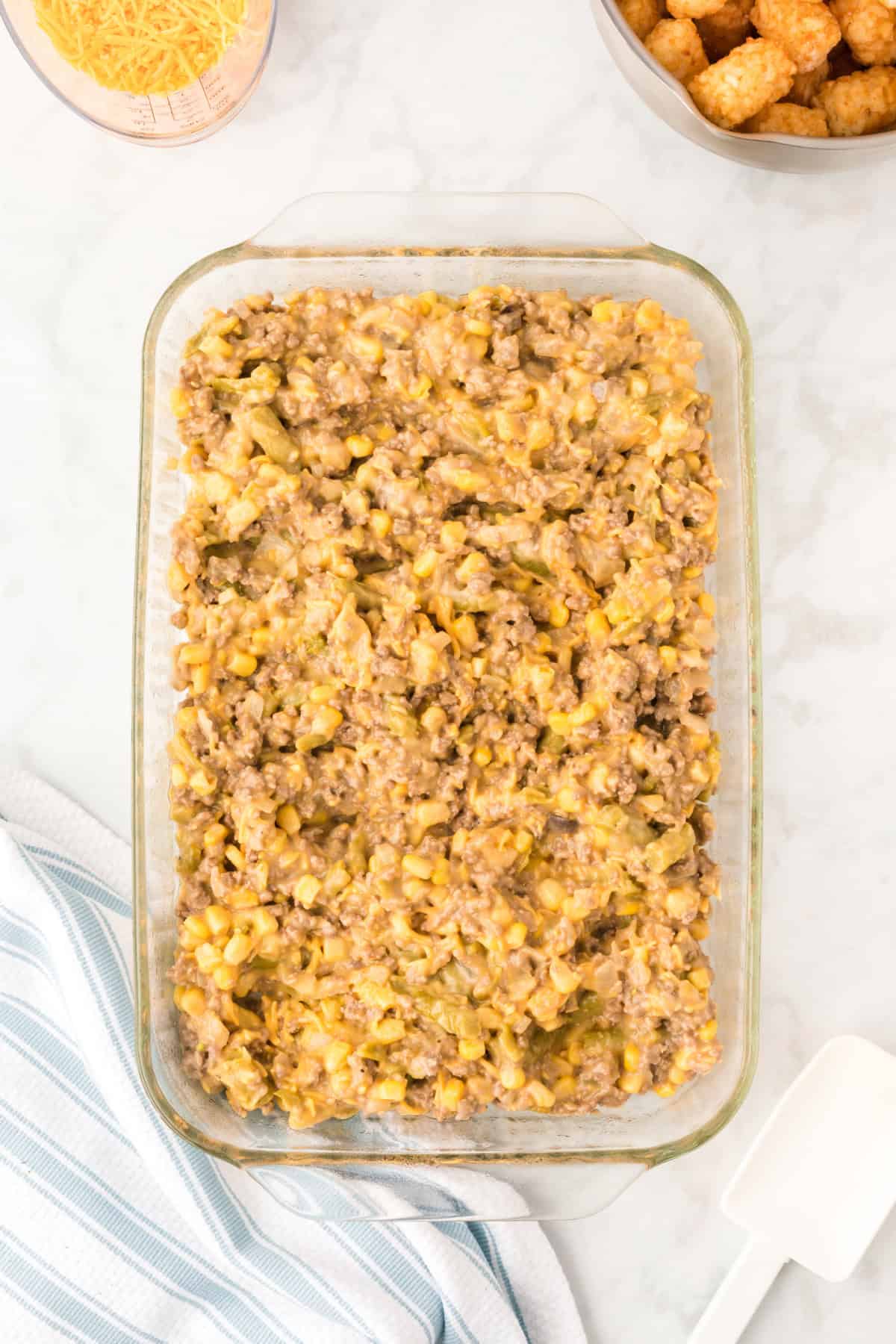 Step 6 in preparing Tater Tot Casserole