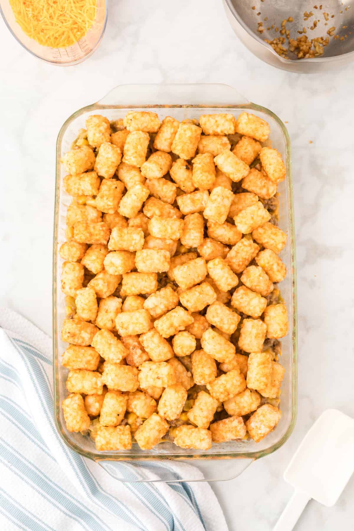 Step 7 in preparing Tater Tot Casserole