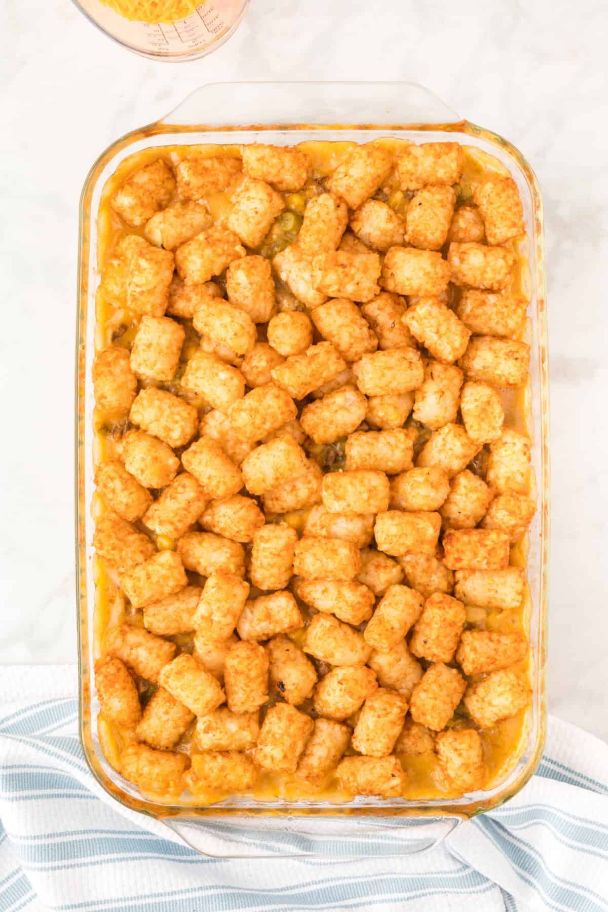 Step 8 in preparing Tater Tot Casserole