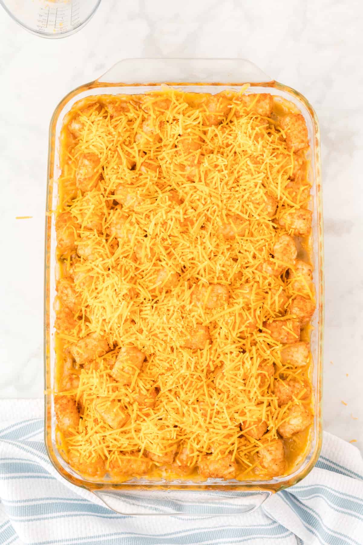 Step 9 in preparing Tater Tot Casserole
